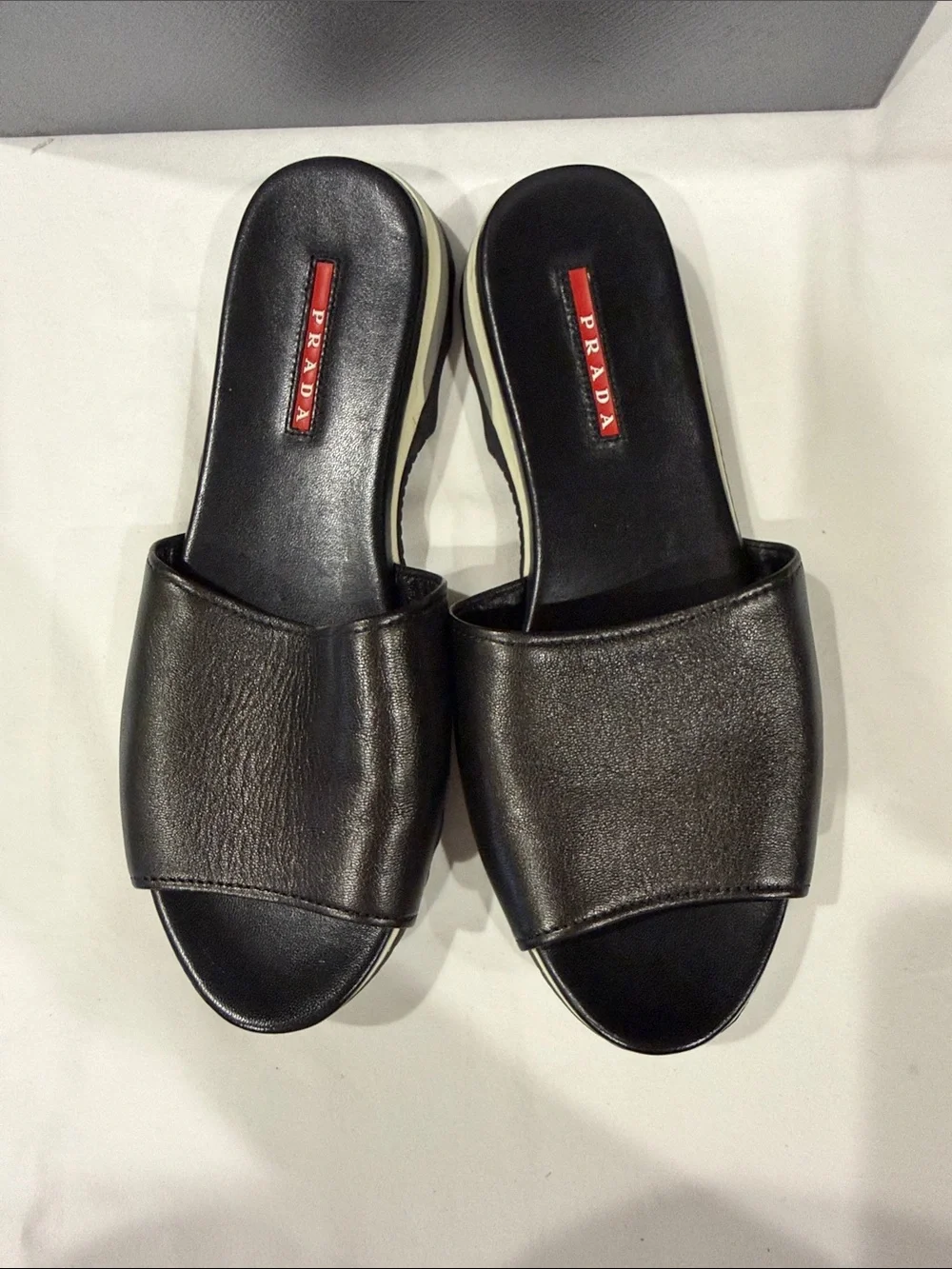 Prada Black Leather Men's Slide Sandals with White Trim